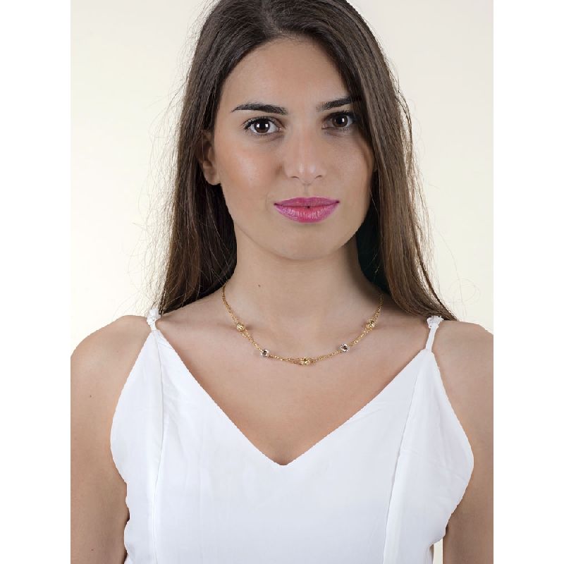 Kette aus 18 Karat Gelbgold und Weißgold mit diamantierten Röllchen