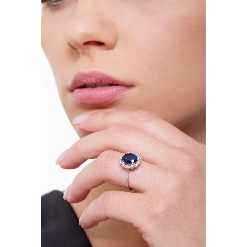 Halo Ring mit blauen Saphir und Brillanten 
