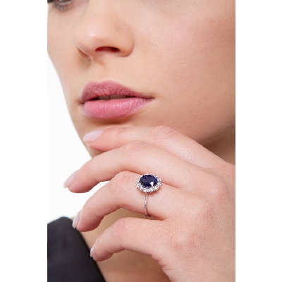 Halo Ring mit blauen Saphir und Brillanten 