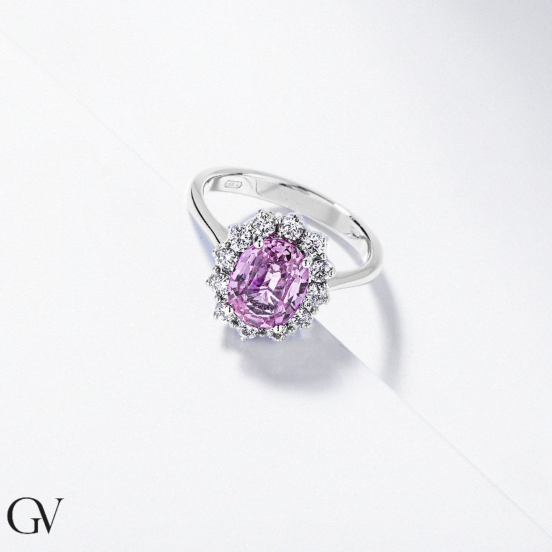 Halo Ring Weißgold mit Diamanten und rosa Saphir Halo Ring Weißgold mit Diamanten und rosa Saphir