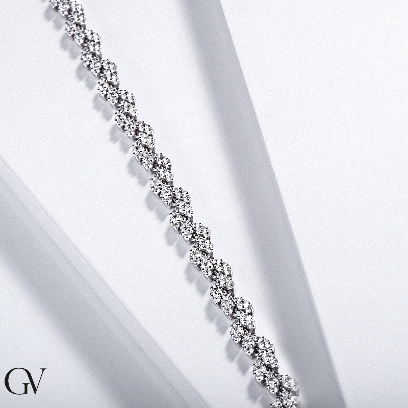 Weißgold 18k Damenarmband mit blattförmigen Diamanten  Weißgold 18k Damenarmband mit blattförmigen Diamanten