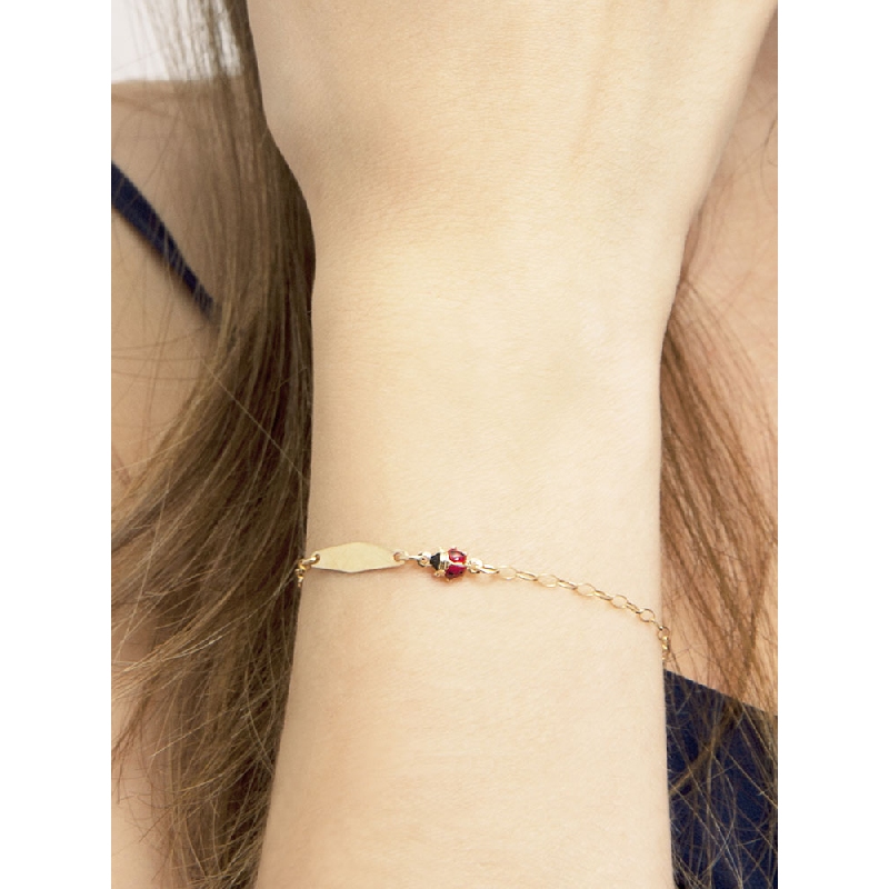 Armband aus 18 Karat Gelbgold mit Marienkäfern und Gravurplatte Armband aus 18 Karat Gelbgold mit Marienkäfern und Gravurplatte