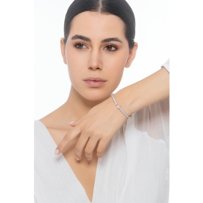 Weißgold 18K Armreif mit Brillanten und zwei Diamanten Tropfenschliff 