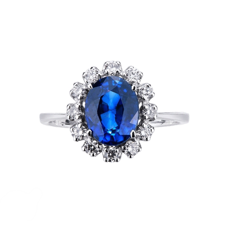 Halo Ring mit blauen Saphir und Brillanten 