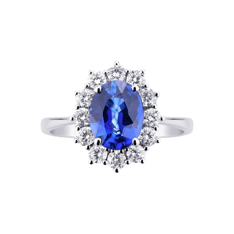 Halo Ring aus Weißgold 750 mit blauem Saphir und Diamanten  Halo Ring aus Weißgold 750 mit blauem Saphir und Diamanten