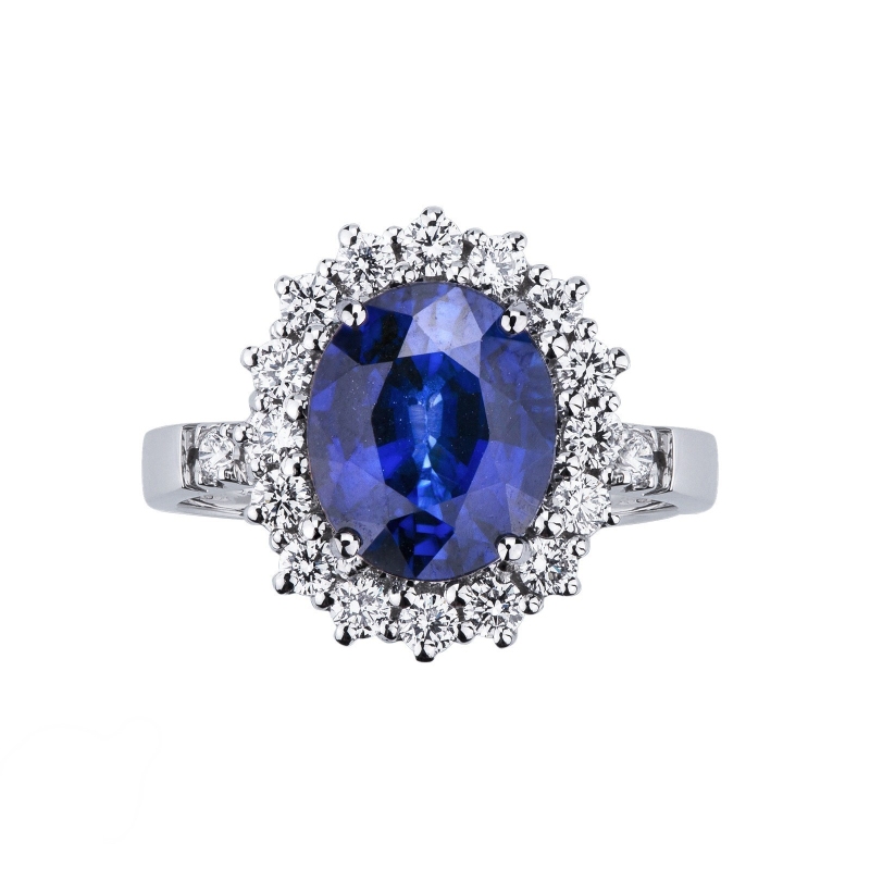 18K Weißgold Halo Ring mit einem blauen Saphir und Diamanten 18K Weißgold Halo Ring mit einem blauen Saphir und Diamanten