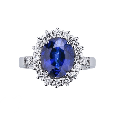 18K Weißgold Halo Ring mit einem blauen Saphir und Diamanten