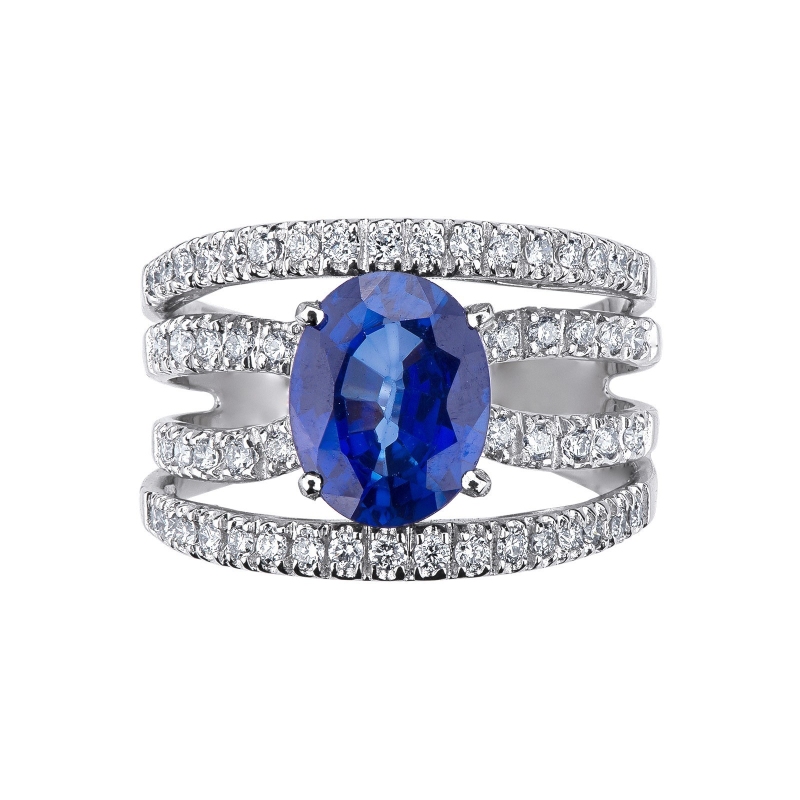 Weißgold Ring Damen mit zentralem Saphir und Diamanten Weißgold Ring Damen mit zentralem Saphir und Diamanten