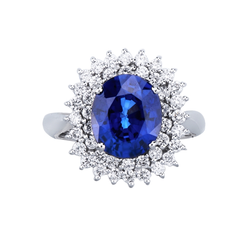 750er Weißgold Halo Ring mit blauem Saphir und Diamanten 750er Weißgold Halo Ring mit blauem Saphir und Diamanten