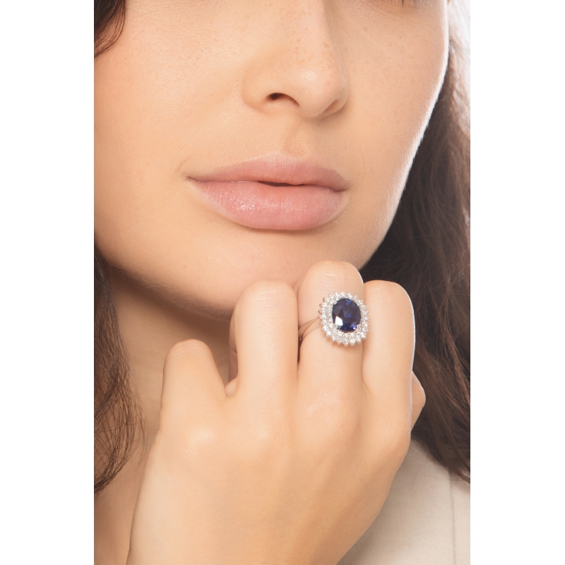 750er Weißgold Halo Ring mit blauem Saphir und Diamanten 750er Weißgold Halo Ring mit blauem Saphir und Diamanten