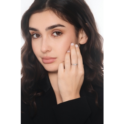 Weißgold Ring 0.15 kt Diamant in einer Spannfassung 